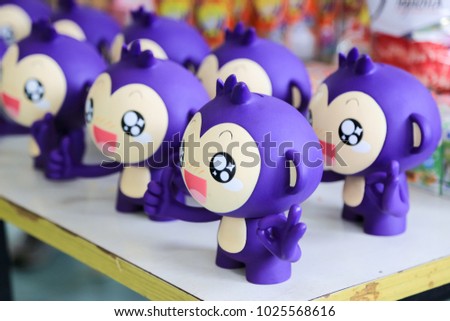 Purple Monkey dolls for piggy bank,. Wich is an idea of  bank for customer to keep money