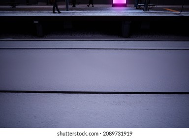 Purple Neon Ad On Winter Rail Station Background