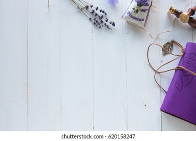 Purple Notebook On A Wooden Background. Flat Lay, Top View 