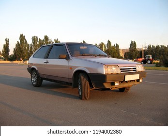 Purple Old Car Hatchback Half Turn View. Photo Exterior Auto.