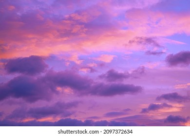  Purple orange pink sunset. Beautiful evening sky with clouds background for design.                               - Shutterstock ID 2097372634