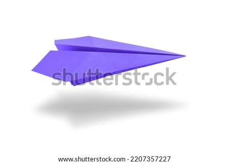 Purple paper plane origami isolated on a blank white background