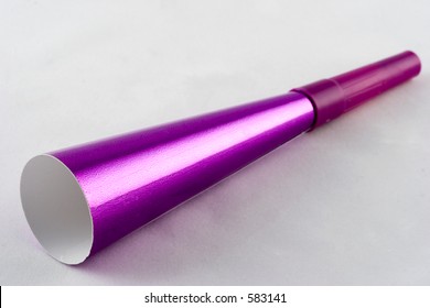 A Purple Party Horn.