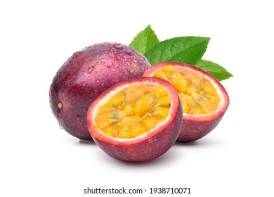 Purple passion fruit (Passiflora edulis) with cut in half and green leaf isolated on white background.