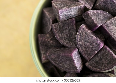 Purple Peruvian Potatoes That Are Raw And Diced