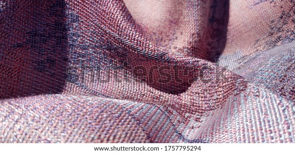 Purple, pink and grey fabric with abstract print, in folds (texture). Wallpaper for walls. 