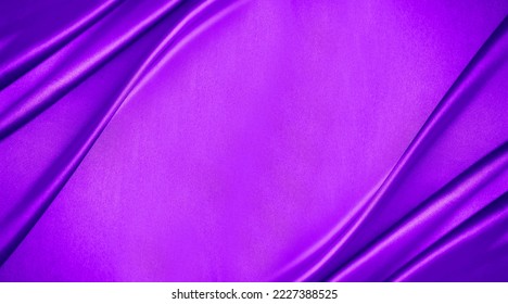 Purple pink lilac blue silk satin. Soft folds. Fabric. Bright luxury background. Space, design. Wavy lines. Banner. Flat lay, top view table. Template. Elegant. Christmas, New Year, Valentine, romance