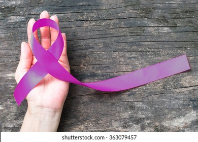 Purple plum color ribbon for raising awareness on Alzheimer's disease, Breastfeeding, Eating disorder, family caregivers, and epilepsy illness - Shutterstock ID 363079457
