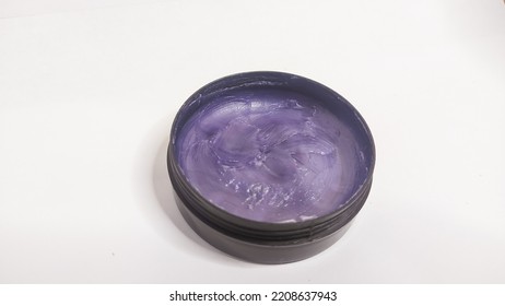 Purple Pomade In A Plastic Container