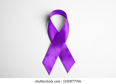 Purple Ribbon On White Background, Top View. Domestic Violence Awareness