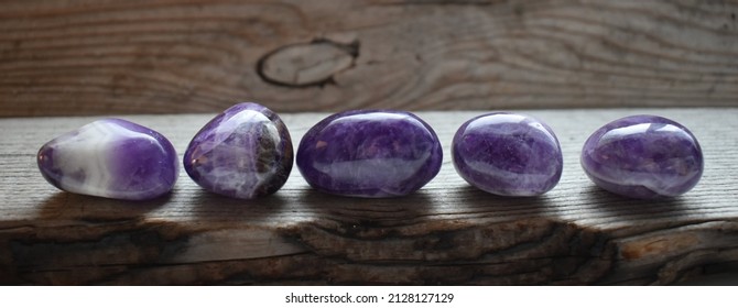 Purple Round Polished Chevron Amethyst Crystals On Old Driftwood