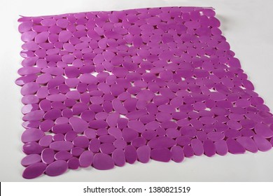 Purple Rubber Mat For Bath With Pattern As Background. Purple Rubber Mat With Suction Cups And Holes Anti Slip For Baby Bath