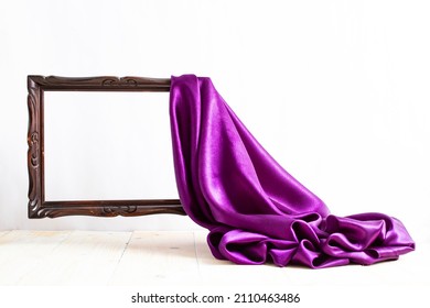 Purple Satin Curtains Unveiling A Levitating Brown Empty Frame, On White Background, Wallpaper Design, Podium Pedestal , Luxury Advertising Display 