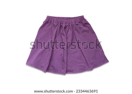 Purple skirt made of cotton fabric isolated on white background. An element of clothing is a short flared summer skirt.