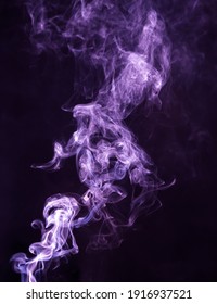 Purple Smoke Isolated On Black Background. 