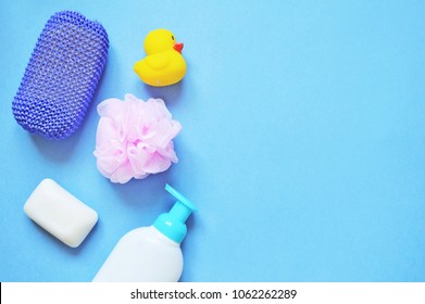 Purple Sponge, Soap Bar, Yellow Rubber Duck And Liquid Soap. Baby Bath Products Flat Lay Photography