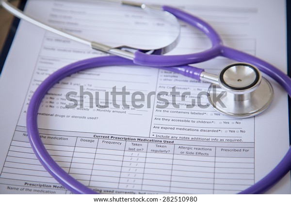 Purple Stethoscope On Glass Desk Stock Image Download Now
