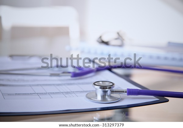 Purple Stethoscope On Glass Desk Stock Photo Edit Now 313297379
