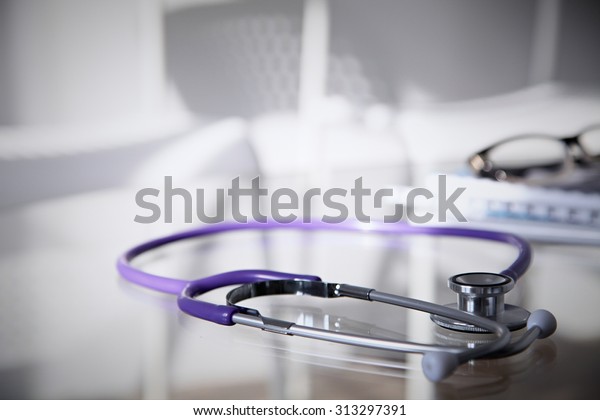 Purple Stethoscope On Glass Desk Stock Photo Edit Now 313297391