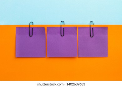 Purple Sticky Notes On An Orange Background
