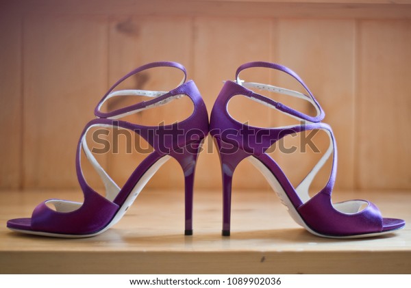purple strappy shoes
