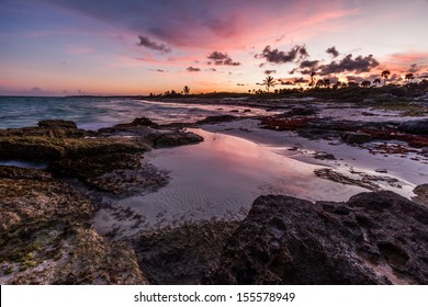 Purple Sunset Over A Tropical Rocky Beach, Riviera Maya, Yucatan, Mexico