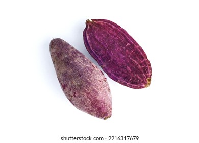 Purple Sweet Potato With Sweet Potato Cut In Half On White Background