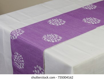 Purple Table Runner On White Table Cloth
