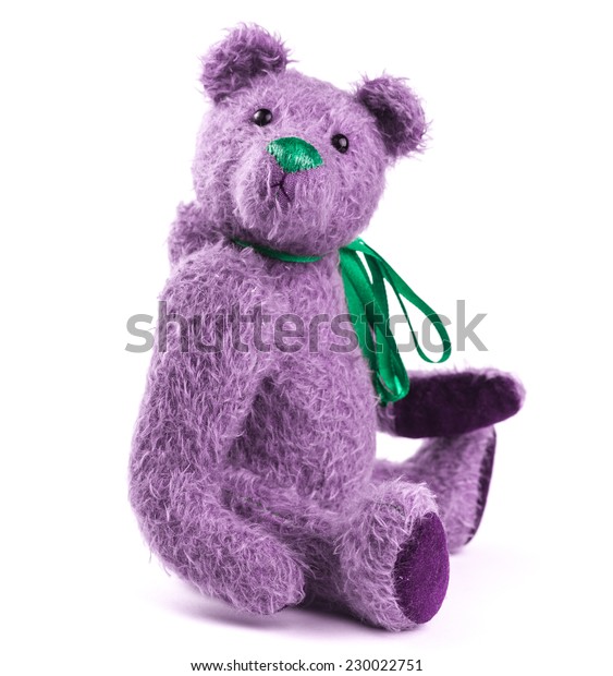 white and purple teddy bear