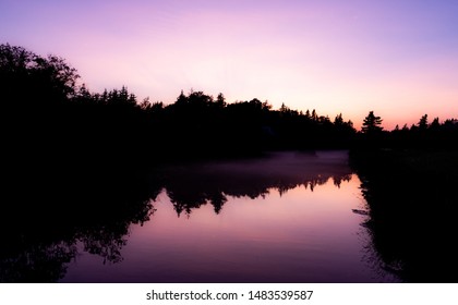 Purple Twilight Above River On Prince Edward Island