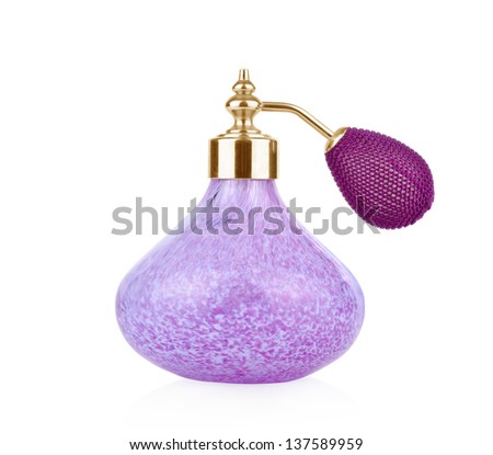 Purple vintage perfume bottle with atomizer  isolated on white background.