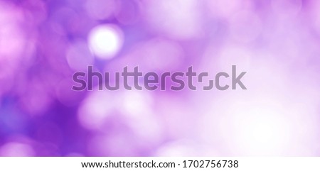 Purple and violet light  leaves blurred and blur natural abstract. Effect sunlight  soft bright shiny style  bokeh circle yellow and orange blurry morning . For wallpaper backdrop and background.
