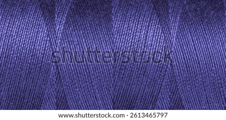 Purple, violet sewing thread texture close up