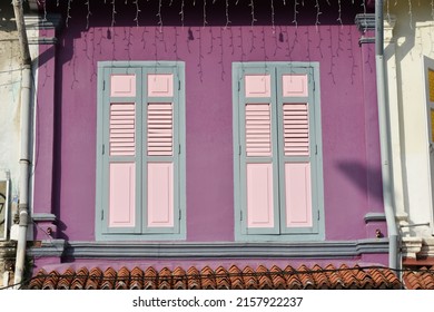 Purple Wall with Pink and Blue Shutters in Kampong Glam