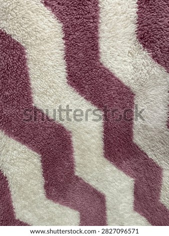 Purple white chevron pattern carpet texture soft zigzag fabric background