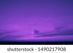 Purple-blue sky and clouds. Background and texture