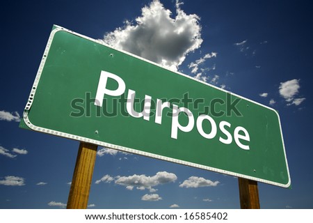 Purpose Road Sign with dramatic clouds and sky.
