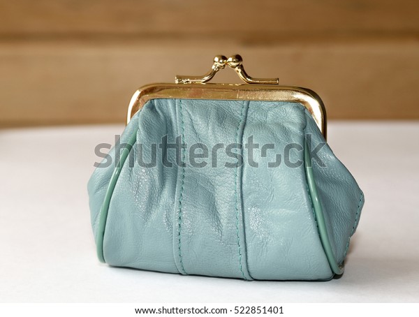 Purse for coins. A leather\
purse .