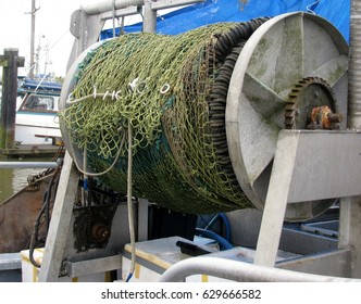 Purse Seine Fishing Net On Reel At The Back Of A Fishing Boat.