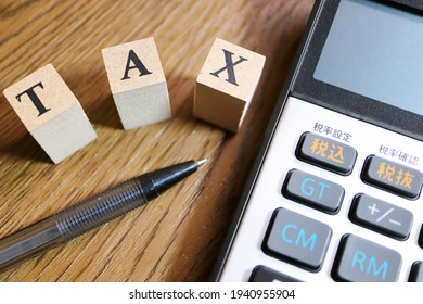 Push buttons on calculators about taxes. Translation: include tax, exclude tax, set tax rate, check tax rate. - Shutterstock ID 1940955904