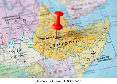 Push pin on the territory of Ethiopia on the world map