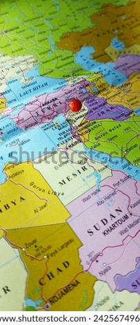 Push red pin or red tack on the territory of Lebanon or Beirut on the world map. Close up zoom image of Vertical image. 