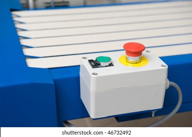 Pushbutton of the conveyor in a warehouse