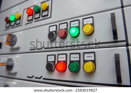 Pushbuttons and switches on the control panel of industrial. 