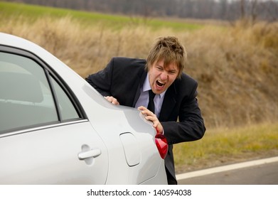 Pushing A Broken Down Car