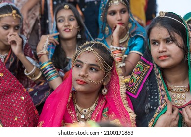 Pushkar, India - Nov 16, 2018 : Indian girls wearing traditional Rajasthani dress participate in Desert Festival in Pushkar, Rajasthan, India