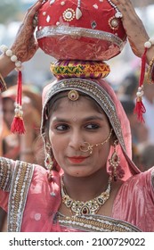 Pushkar, India - Nov 16, 2018 : Indian girl wearing traditional Rajasthani dress participate in Desert Festival in Pushkar, Rajasthan, India