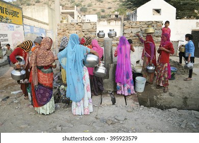 Pushkar, India-November 23, 2015:Unidentified Local Indian Women Waiting Thier Turn To Collecting Water. Many Parts Of Urban India Are Experiencing Acute Water Shortage As Cities Expand Rapidly.