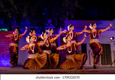 PUSHKAR, RAJASTHAN / INDIA  NOVEMBER 2019 : Indian girls performing Indian classical Odissi dance