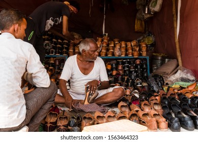 Pushkar, Rajasthan/India - November 2019 : Boot Maker (Mochi) Preparing Shoes In The Pushkar Fair